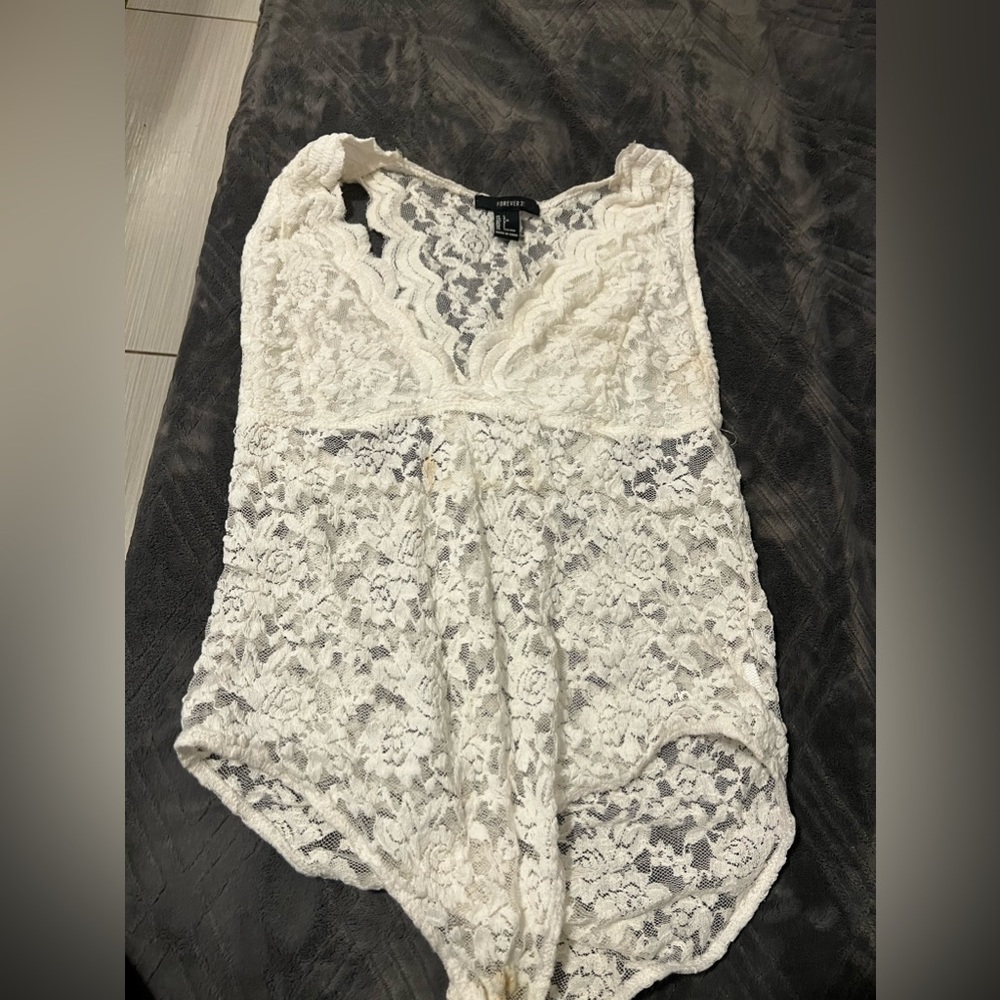 Lacy white bodysuit